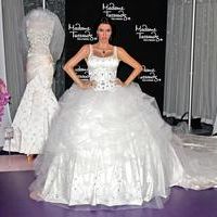 The unveiling of Kim Kardashian s wedding-themed wax figure dress